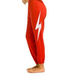 Red bolt sweatpants